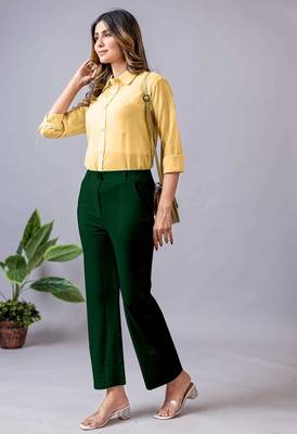 women solid dark green regular fit mid-rise flat front trousers 5