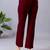 Women solid maroon regular fit mid-rise flat front trousers