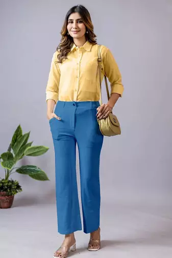 women solid blue regular fit mid-rise flat front trousers