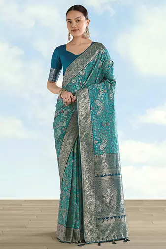 Turquoise faux banarasi silk saree with traditional paisley weaves