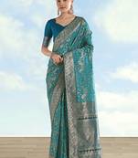 Turquoise faux banarasi silk blend saree with traditional paisley weaves