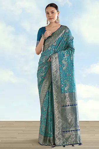 Turquoise faux banarasi silk blend saree with traditional paisley weaves