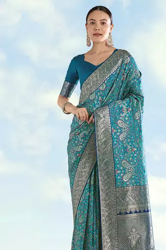Turquoise faux banarasi silk blend saree with traditional paisley weaves