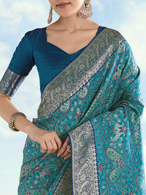 Turquoise faux banarasi silk blend saree with traditional paisley weaves 4