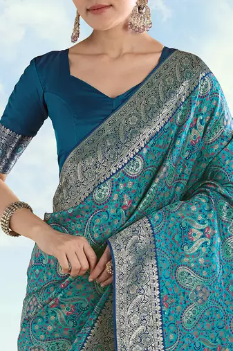 Turquoise faux banarasi silk blend saree with traditional paisley weaves
