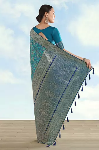 Turquoise faux banarasi silk blend saree with traditional paisley weaves
