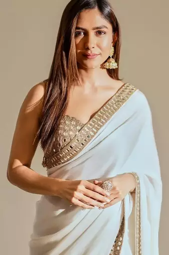 white silk blend saree with mirror work embroidery