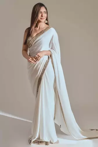 white silk blend saree with mirror work embroidery