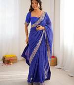 Blue color faux georgette bandhni print & embroidered border saree