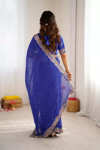 blue faux georgette saree with bandhani print border