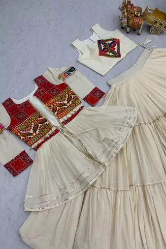 heavy gamthi work with mirror lace work cream lehenga set with jacket