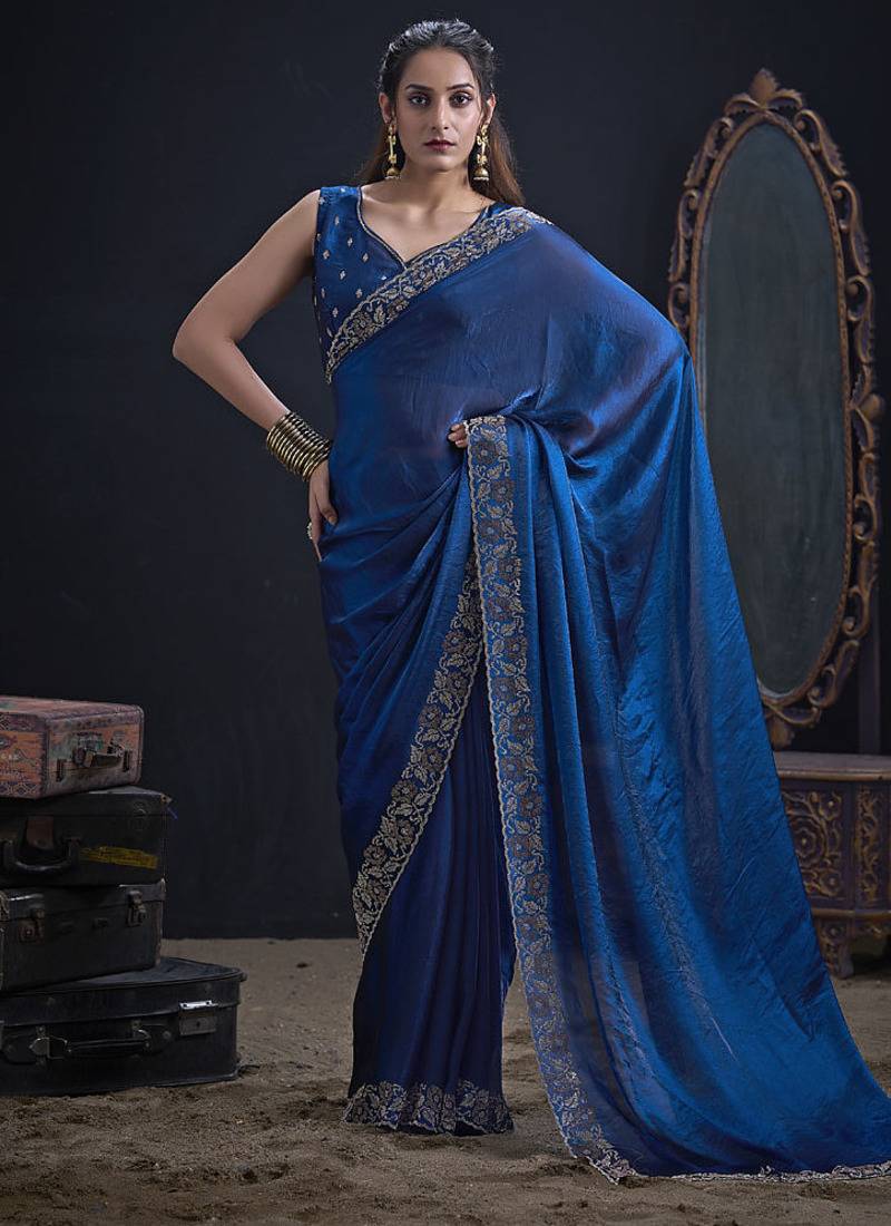 Indian teal blue heavy hand work zarkan border silk saree