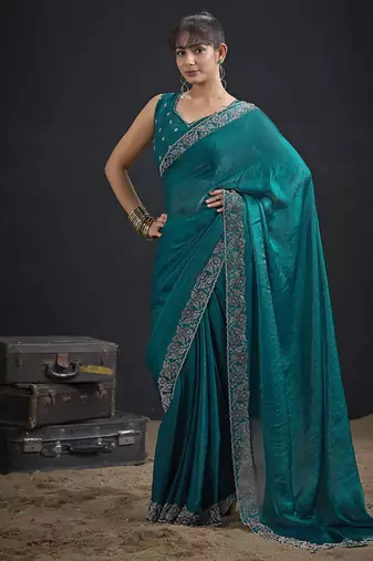 Indian rama green heavy hand work zarkan border silk saree