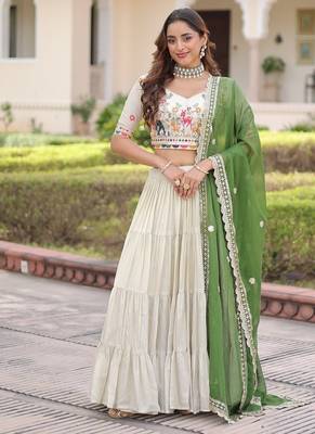 white cosmos silk lehenga choli with green embroidered dupatta 1