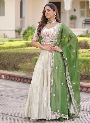 white cosmos silk lehenga choli with green embroidered dupatta 2