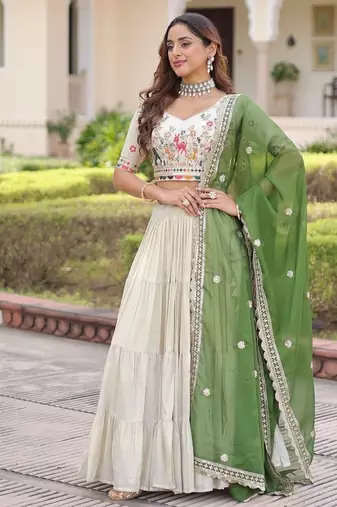 white cosmos silk lehenga choli with green embroidered dupatta