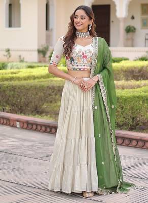 white cosmos silk lehenga choli with green embroidered dupatta 3