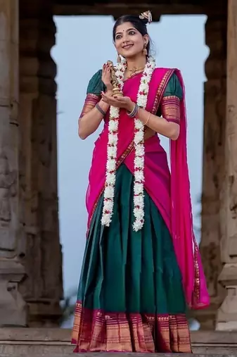 dark green kanjivaram silk half saree with gold zari weaving