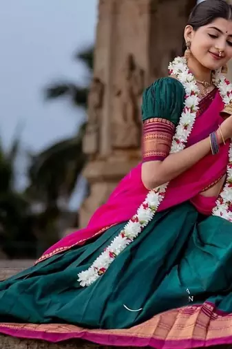 dark green kanjivaram silk half saree with gold zari weaving
