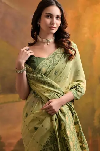 pista green muga cotton saree with woven butti design