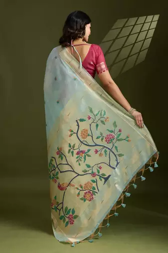 sky blue muga cotton saree with zari woven border