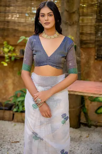 white navy blue muga silk saree with floral weaving work