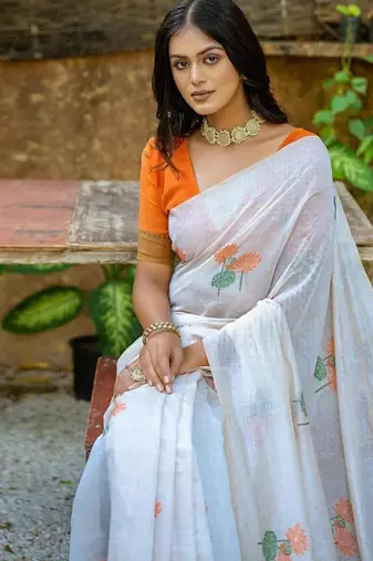 white orange muga silk saree with floral weaving work