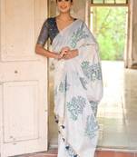 white blue cotton saree with woven floral zari border design