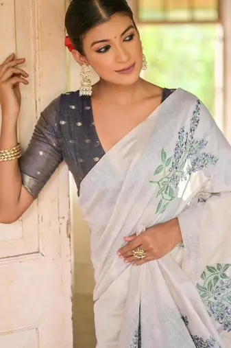 white blue cotton saree with woven floral zari border design