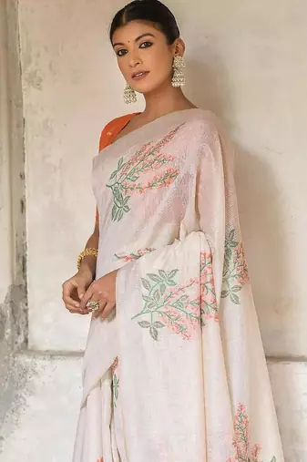 white orange cotton saree with zari patta floral woven pattern