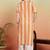 Women's cotton crape calf length strip print half length sleeve v-neck straight kurta (orange )