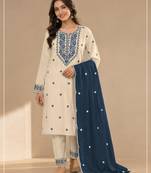 Chickoo color embroideried cotton blend semi stitched salwar suit