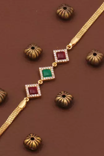 gold metal bracelet with lobster clasp design