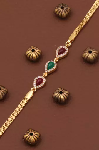 multicolor brass bracelet with american diamond stone work