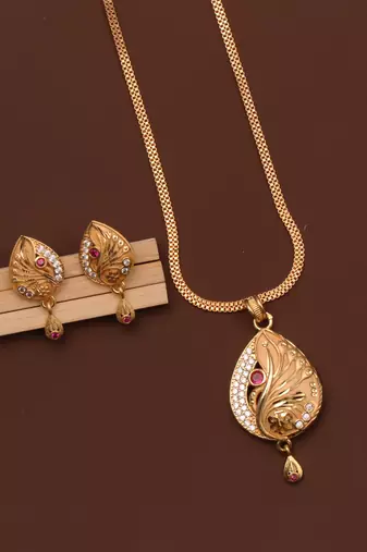 gold-plated pendant with traditional stone work