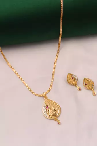 gold-plated pendant with traditional stone work