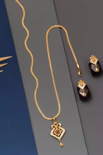 gold-plated pendant set with traditional stone work