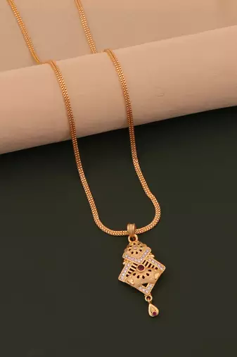 gold brass jewelry pendant with ad stone work design