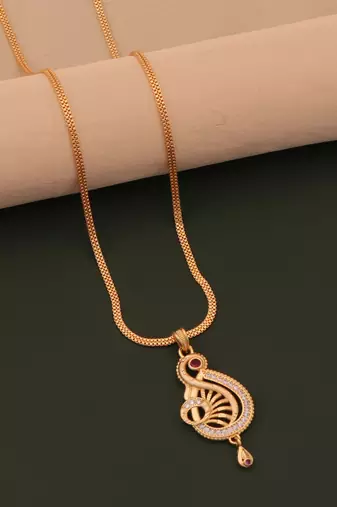 gold brass pendant set with american diamond work design