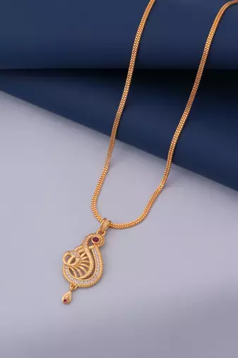 gold brass pendant set with american diamond work design