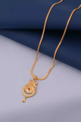 gold brass pendant set with diamond stone work earrings