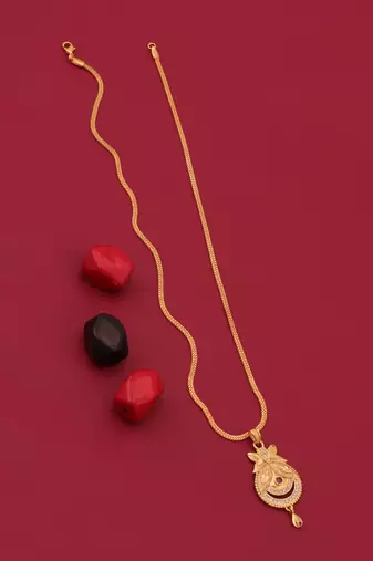 gold brass pendant set with diamond stone work earrings