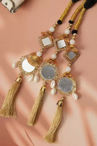 gold crystal parandi with classic mirror work design