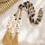 Gold plated shell tassel white parandi