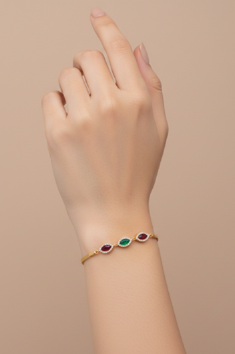 gold metal bracelet with traditional design
