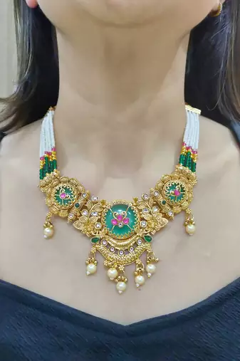 green copper necklace set with pearl studded work