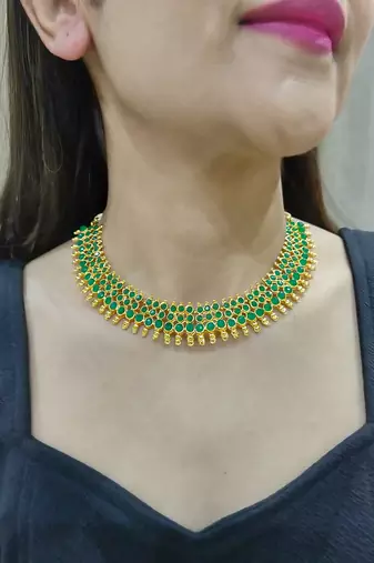 green copper necklace set with studded work