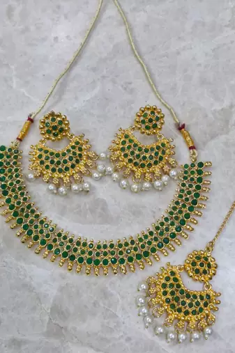 green copper necklace set with studded work