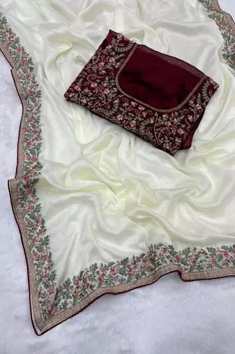 white silk saree with embroidery and zari work