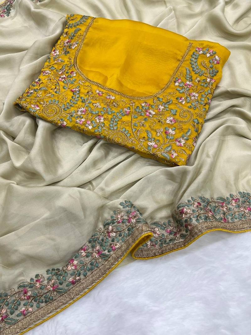 Beige Color Embroidery and zari work Silk Saree